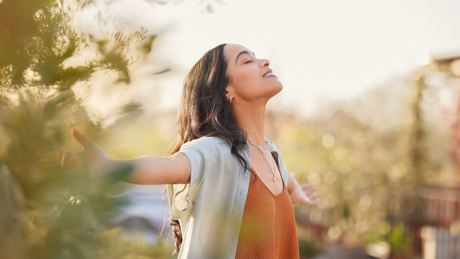 Dayanna Volitich smiling at the sun